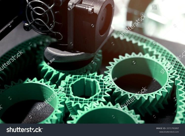 stock-photo-detail-view-on-print-head-of-d-printer-making-a-planetary-gear-part-from-mint-coloured-plastic-2271791897.jpg