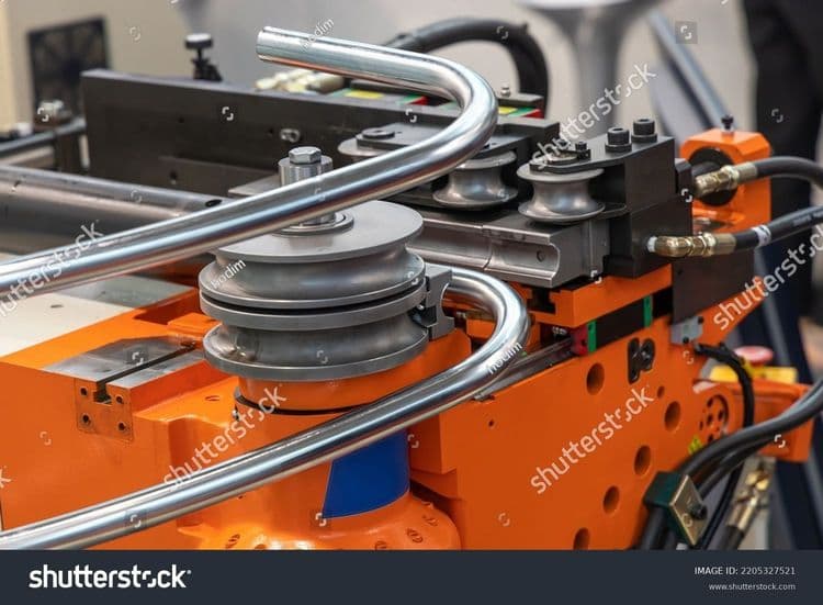 stock-photo-hydraulic-pipe-bender-bends-round-stainless-steel-pipe-pipe-bending-machine-in-a-factory-bent-2205327521.jpg