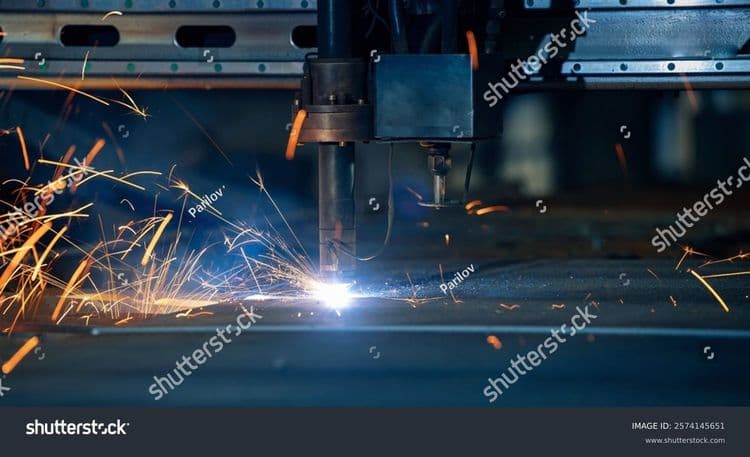 stock-photo-plasma-cutting-machine-cuts-metal-material-with-sparks-industrial-background-2574145651.jpg