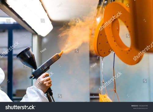 stock-photo-powder-coating-of-metal-parts-a-woman-in-a-protective-suit-sprays-powder-paint-from-a-gun-on-metal-1053664748.jpg